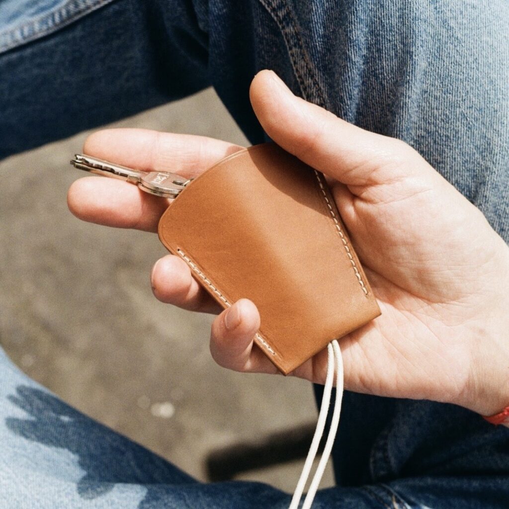 Laperruque porte-clés cuir